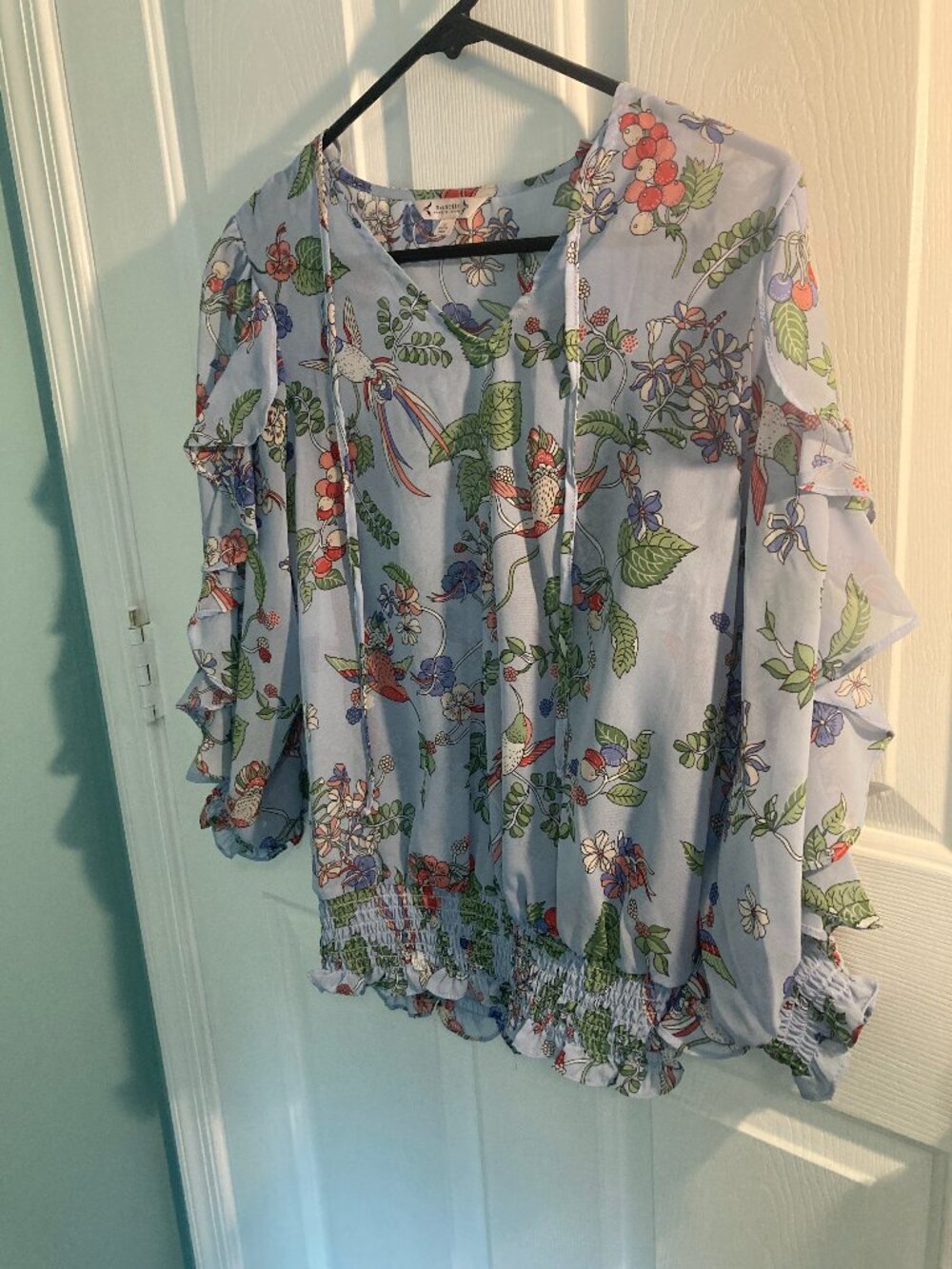 Light blue floral blouse, size Small.